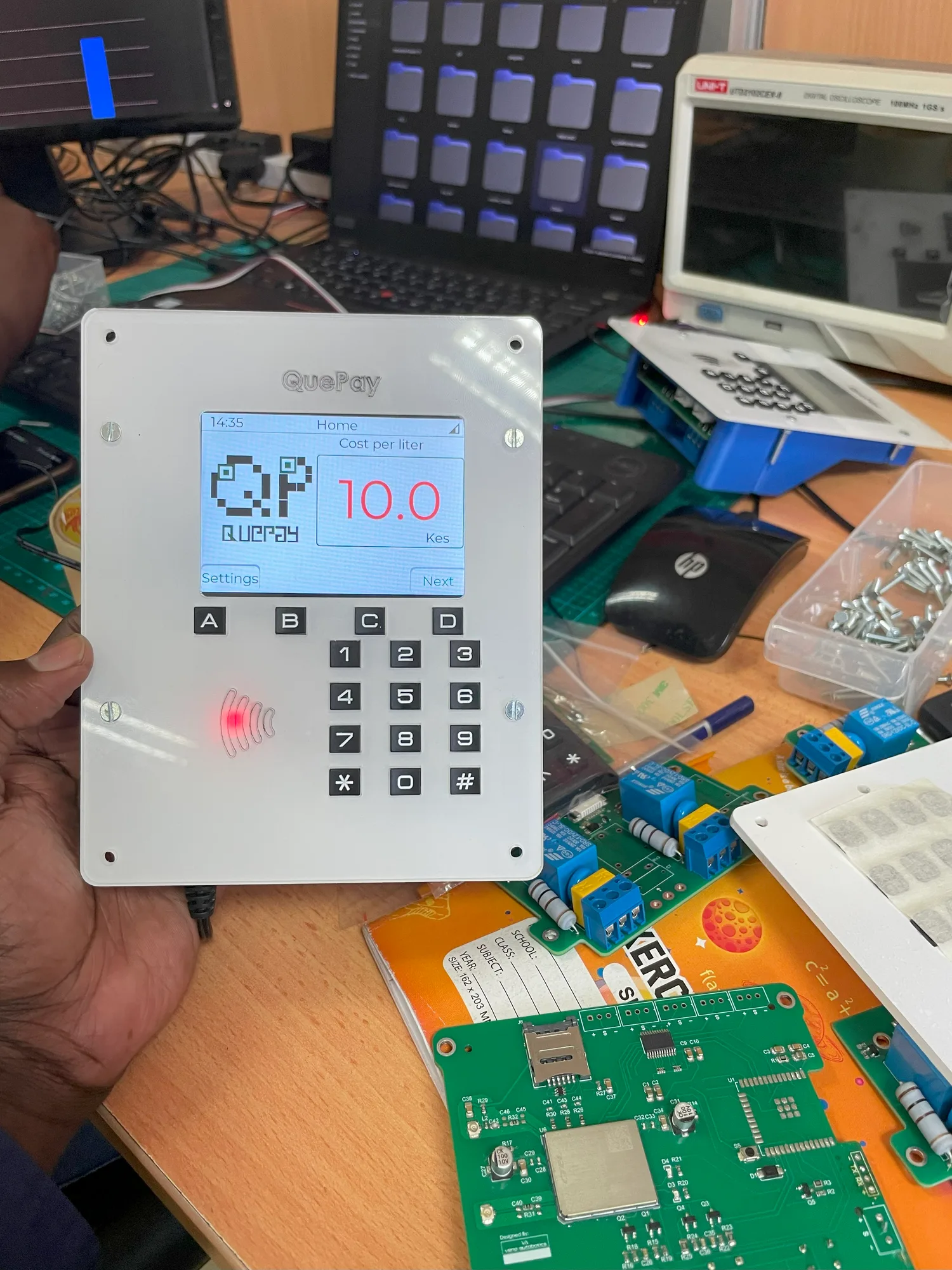 QuePay controller showing live payment — KES 10.0 per litre